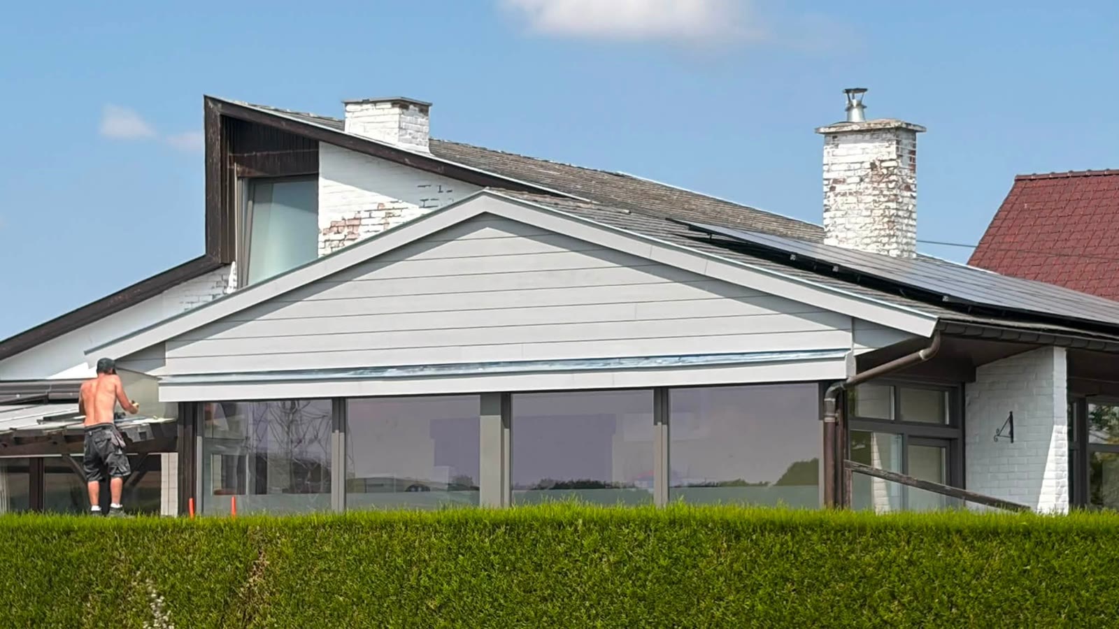 Rénovation moderne d'un pignon vitré